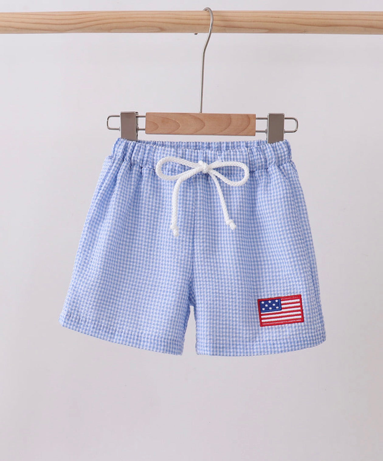 Blue flag embroidered gingham shorts