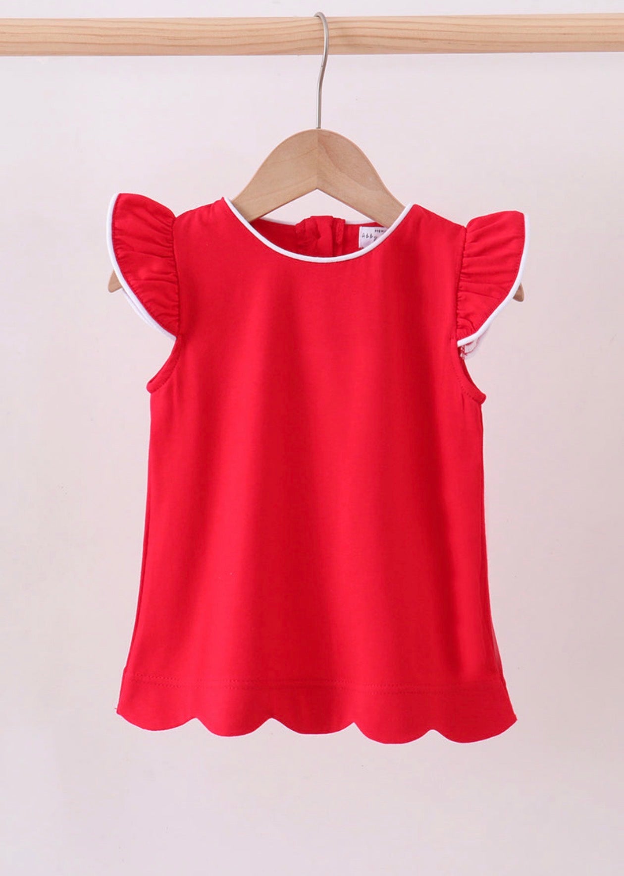 Red flutter sleeve scalloped top
