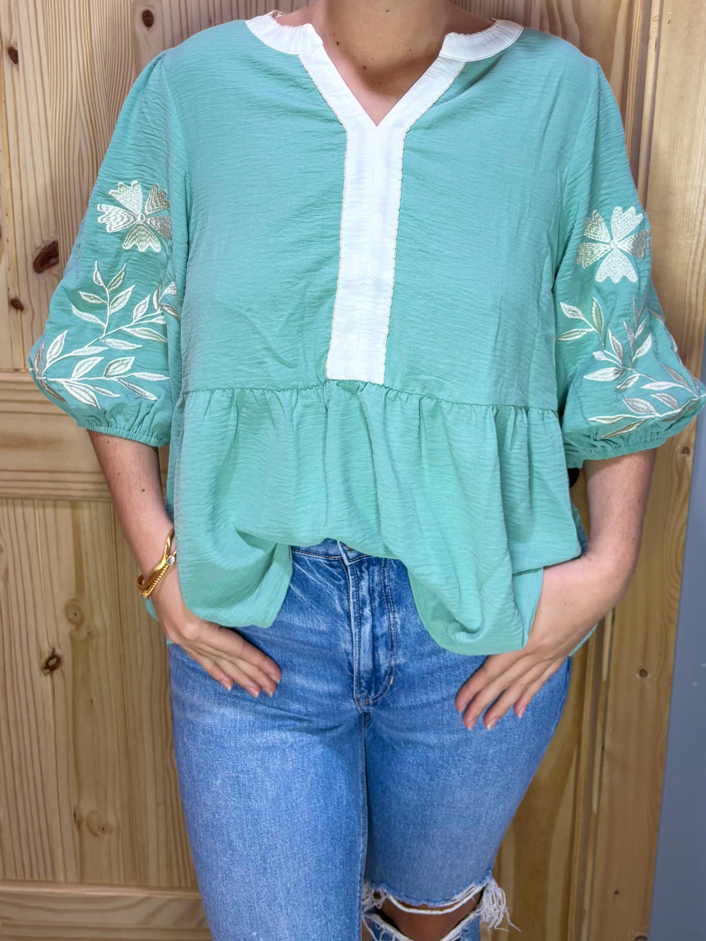 Floral embroidered v-neck puff sleeve babydoll blouse
