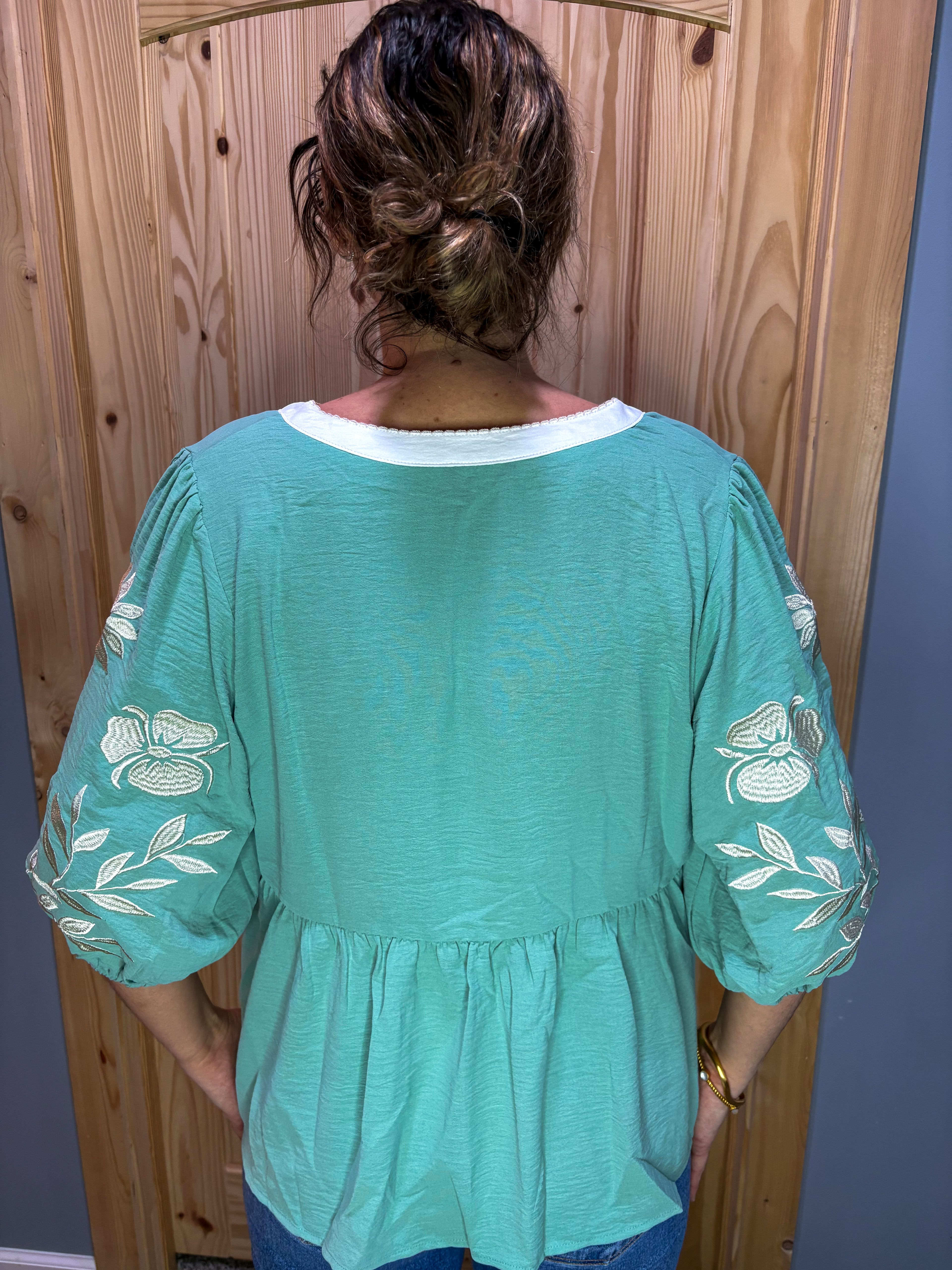 Floral embroidered v-neck puff sleeve babydoll blouse